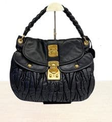 Miu Miu กระเป๋าถือพร้อมสายสะพาย - สีดำ - image blurred placeholder