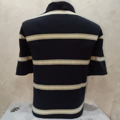 เสื้อเชิ้ตคอปก Tommy Hilfiger - image blurred placeholder