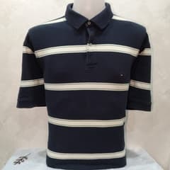 เสื้อเชิ้ตคอปก Tommy Hilfiger - image blurred placeholder