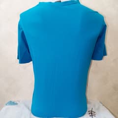 เสื้อยืดโปโล - image blurred placeholder