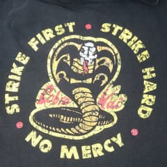 เสื้อ cobra kai - image blurred placeholder
