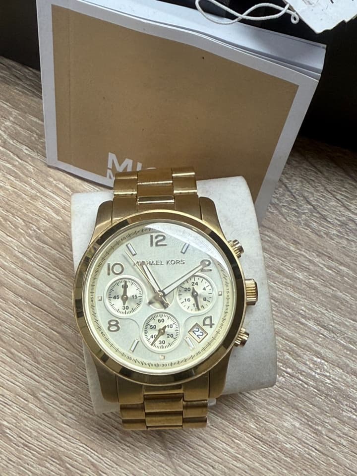 นาฬิกา Michael Kors รุ่น MK5055 โครโนกราฟสีทองสำหรับผู้หญิงจากคอลเลกชัน