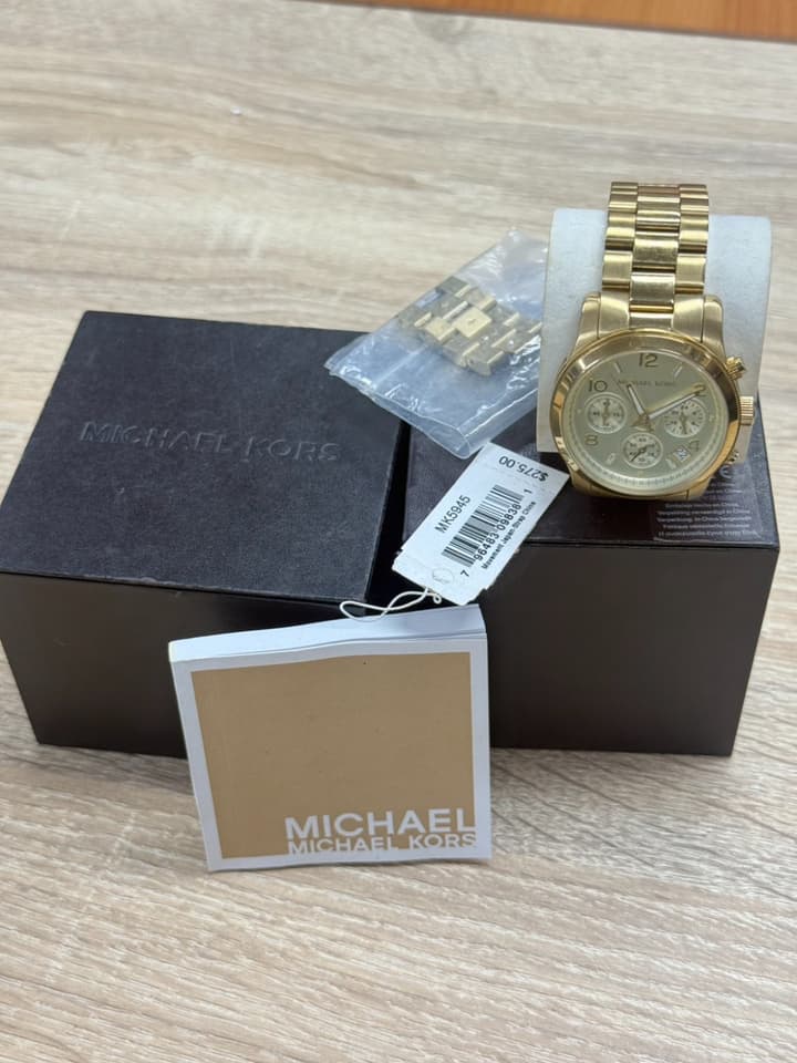 นาฬิกา Michael Kors รุ่น MK5055 โครโนกราฟสีทองสำหรับผู้หญิงจากคอลเลกชัน