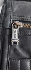 TUMI genuine cowhide leather shoulder bag, Beale Messenger model, 100% cowhide leather - image blurred placeholder