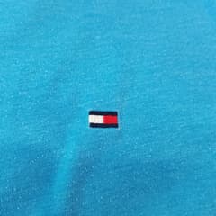 เสื้อ Tommy Hilfiger - image blurred placeholder