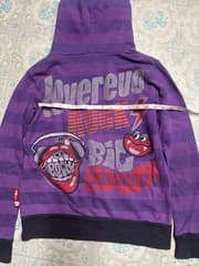 Y2K-style hoodie by Belle Revolution - image blurred placeholder