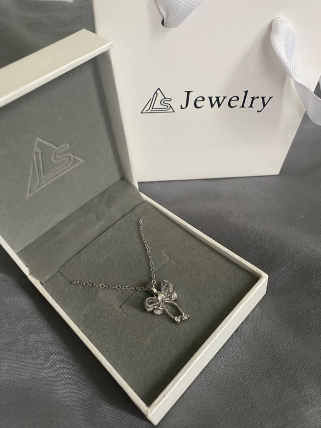 Necklace with bow pendant set with crystals, LS Jewelry