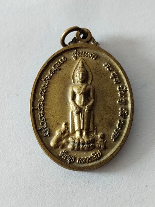 Luang Pho Phet amulet coin, teardrop shape, gold-plated, brown enamel
