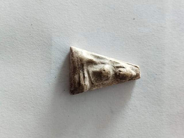 Phra Nang Phaya, triangular mold, sacred powder material, stamped yantra code on the back, old stored condition