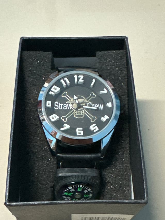 "One Piece" wristwatch, Log Pose model, featuring a pirate skull dial design