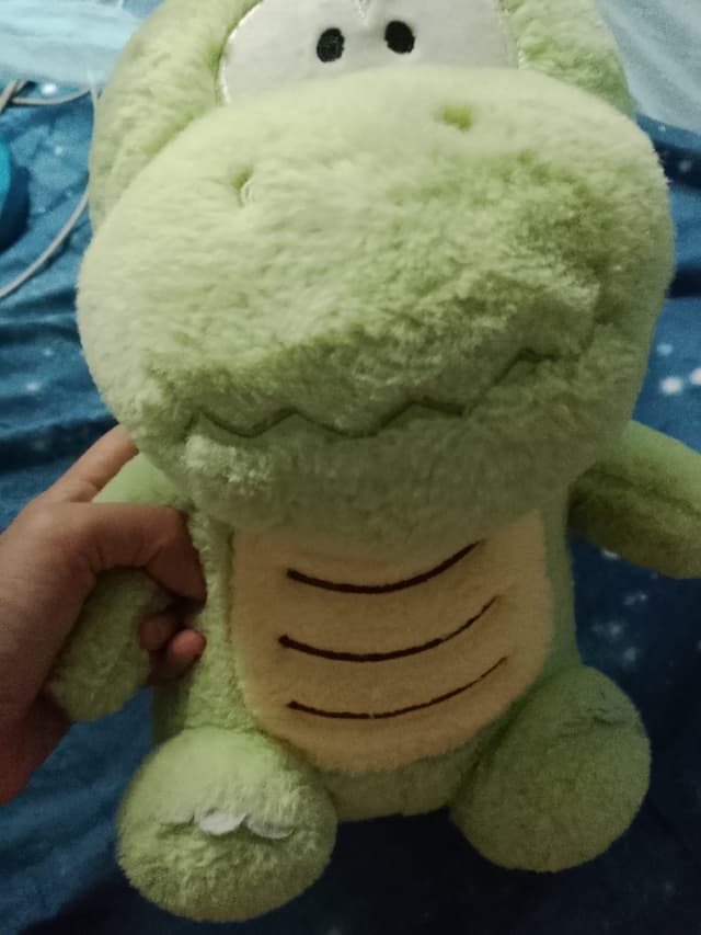 ตุ๊กตาไดโนเสาร์สีเขียว