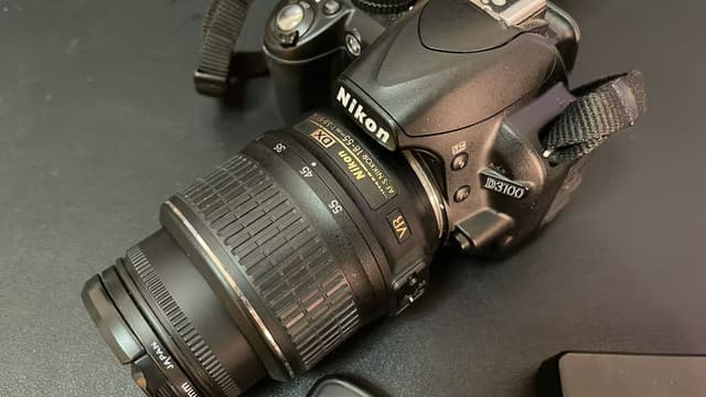 Nikon D3100 camera with 18-55mm lens, used, 100% working condition