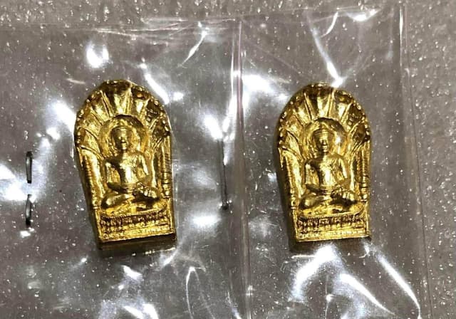 Naga-Protected Buddha Amulet by Phra Ajarn Adirek