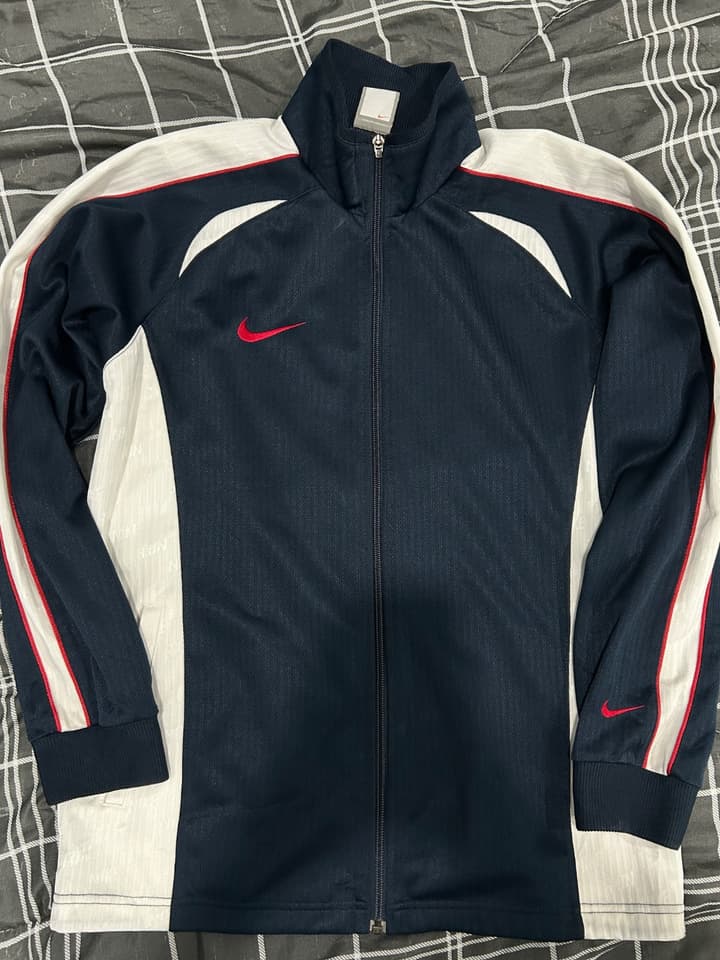 เสื้อคลุมวอร์ม Nike