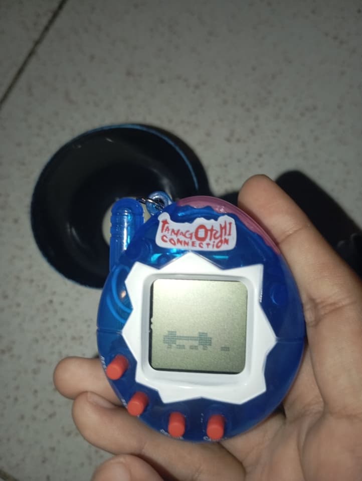 Tamagotchi Dinosaur Egg-Shaped Case, Brand New