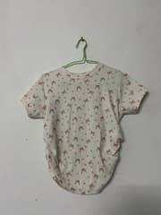 White Shirt with Pink Bow Pattern - image blurred placeholder