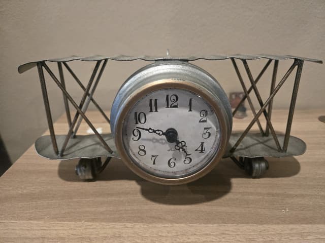 Decorative airplane-shaped desk clock